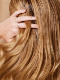 a model after using medium blonde hair color by khadi
