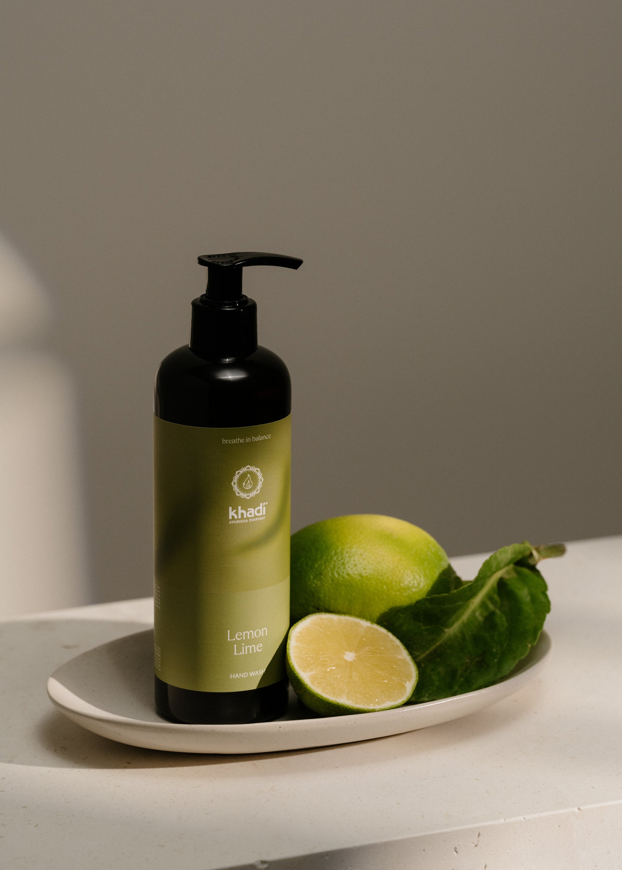 Creative still life of Ayurveda Everyday Lemon Lime Hand Soap – gentle and revitalizing hand cleansing